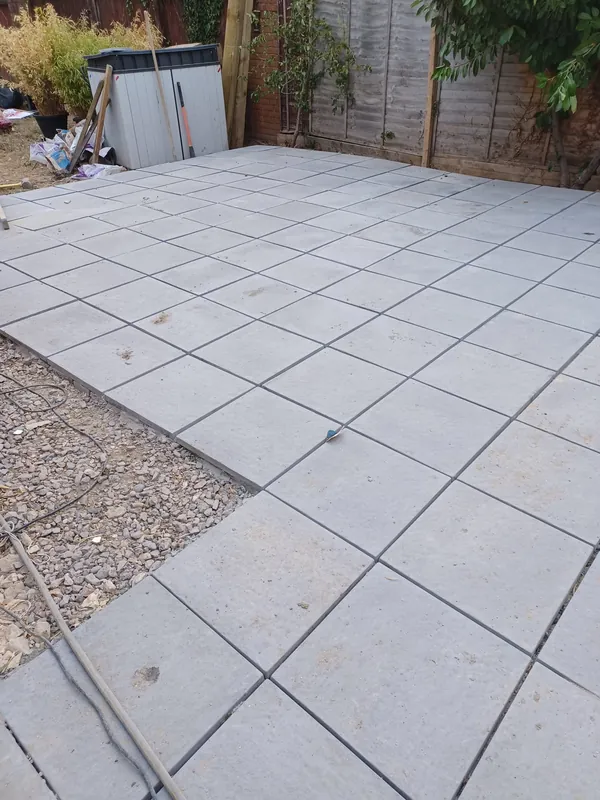 Slabs being bedded on mortar and levelled